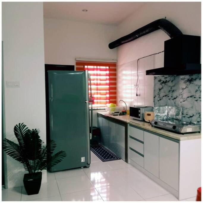 Homestay Ibu Іпох Екстер'єр фото